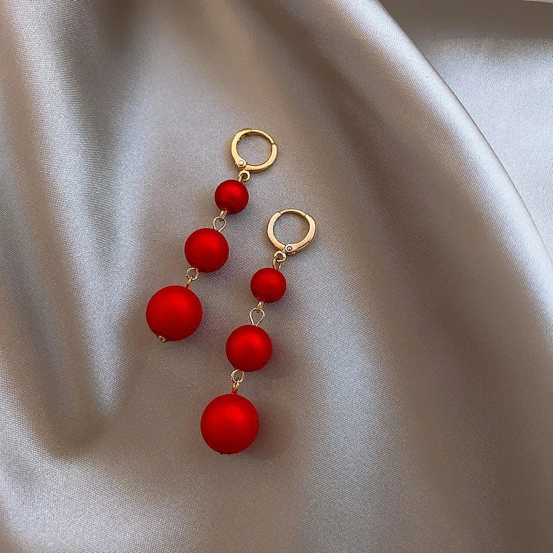 Boucle d&#39;oreille rouge pendante