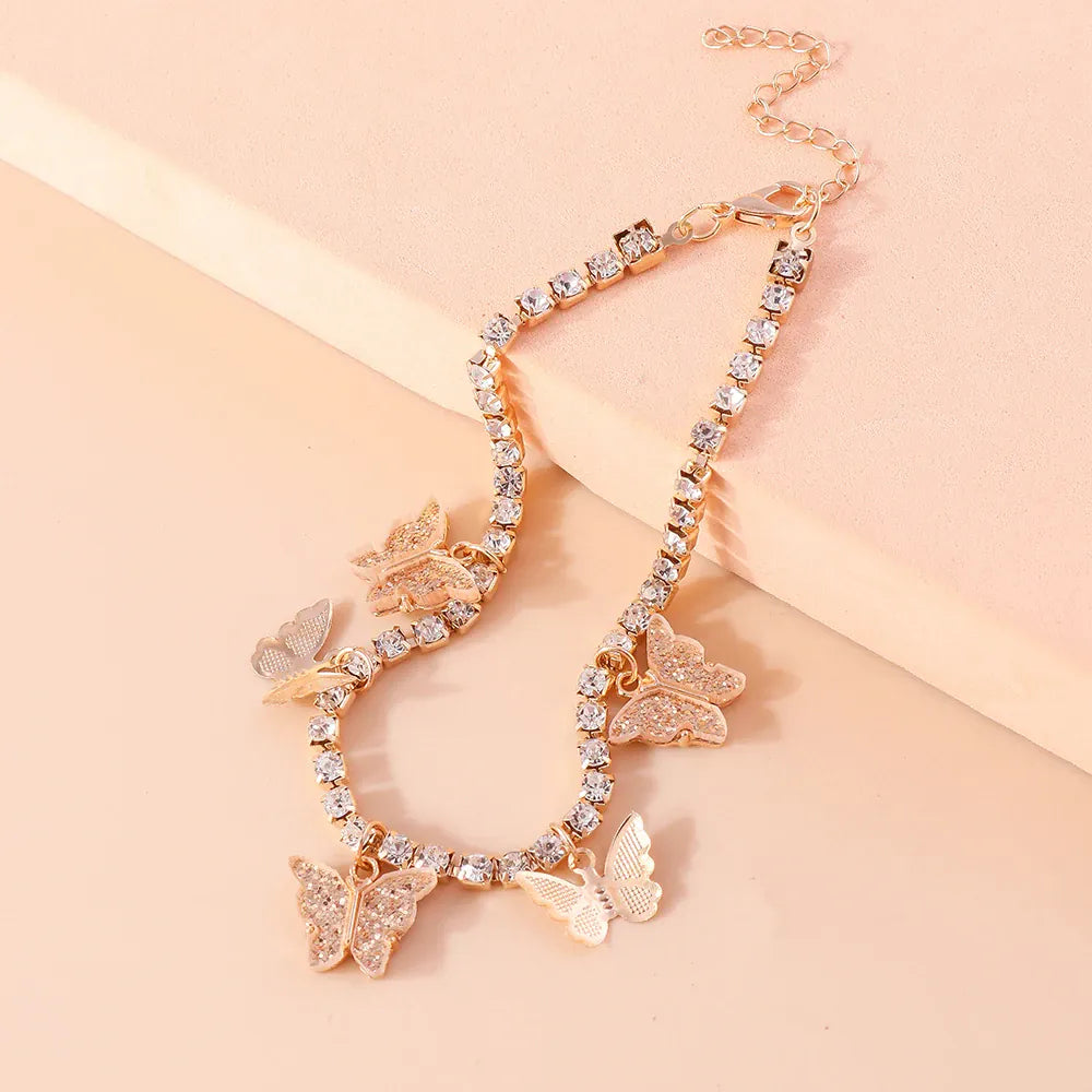 Chaine de Cheville Papillon Dorée