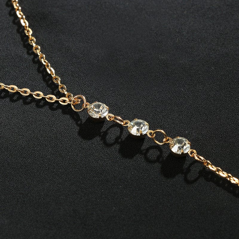 Collier dans le dos strass