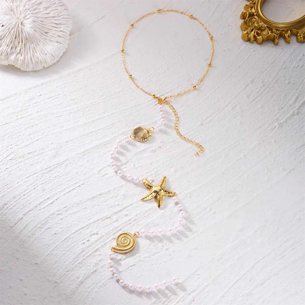 Collier de Dos Ete Perle