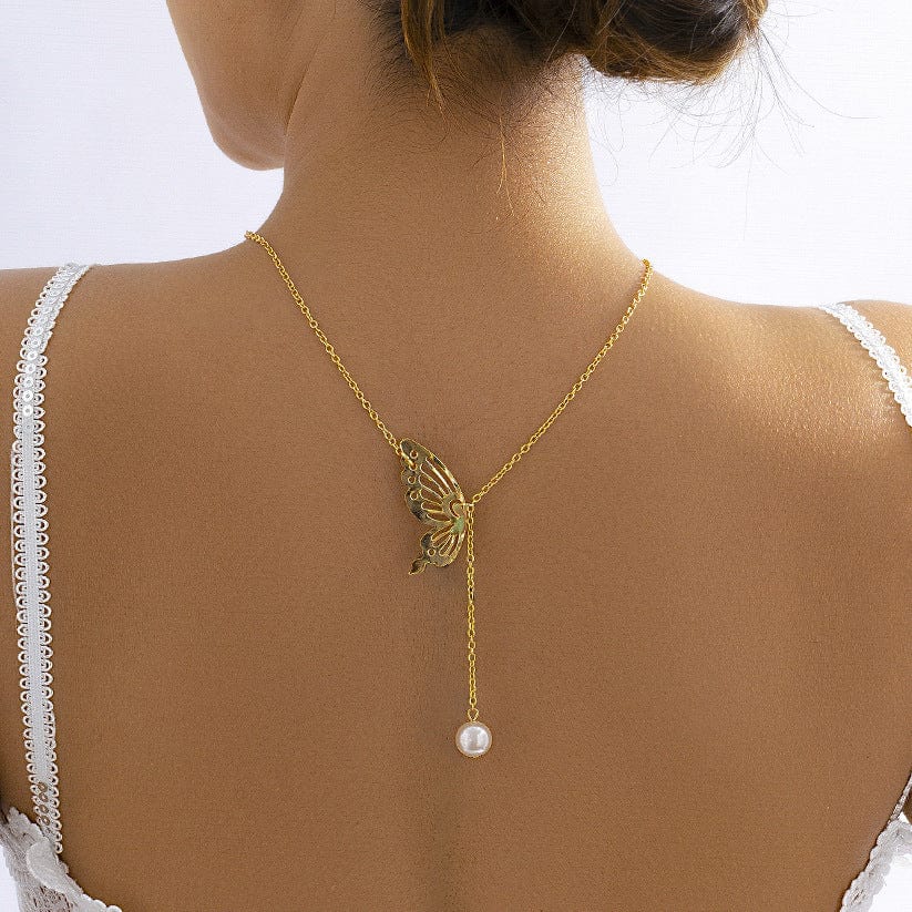 Collier de dos papillon