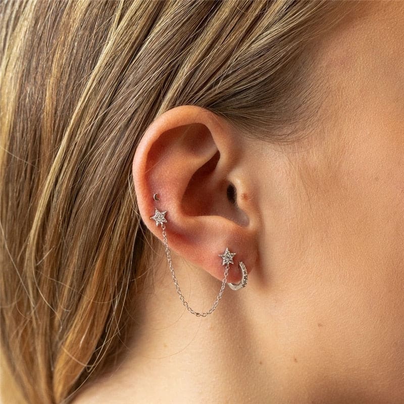 Boucle d'oreille chaine 2 trous étoiles