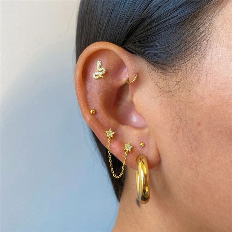 Boucle d&#39;oreille chaine 2 trous étoiles