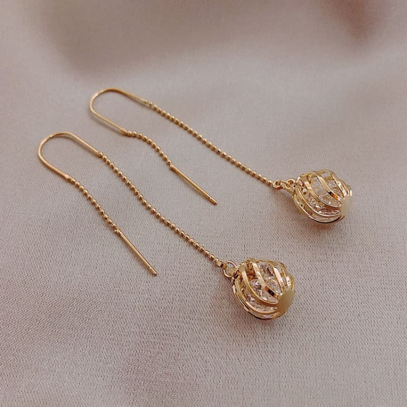 Boucle d&#39;oreille chaine cage dorée