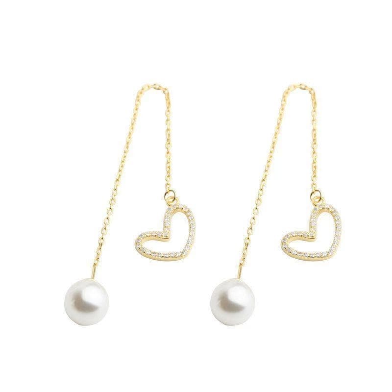 Boucle d'oreille chaine traversante avec coeur