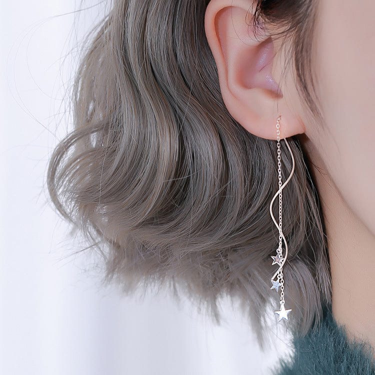Boucle d'oreille femme moderne