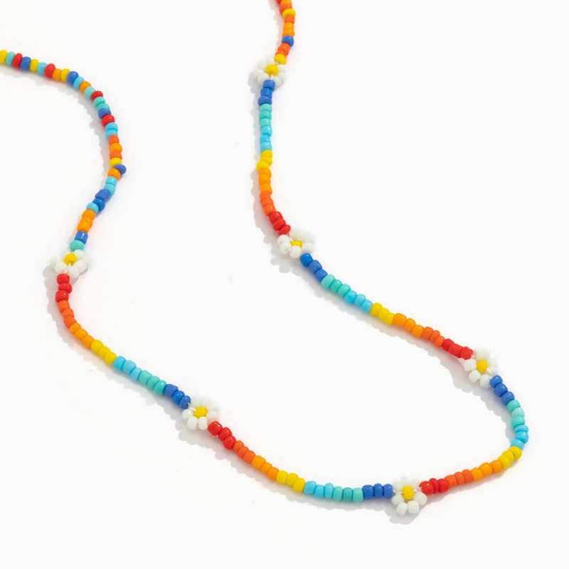 Chaine de taille arc-en-ciel avec marguerite