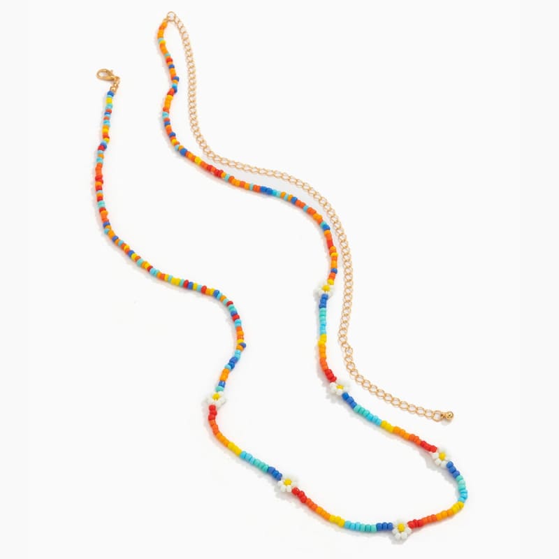 Chaine de taille arc-en-ciel avec marguerite