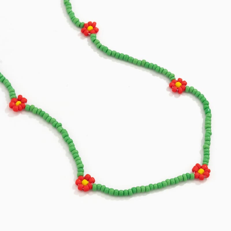 Chaine de taille avec fleurs colorées