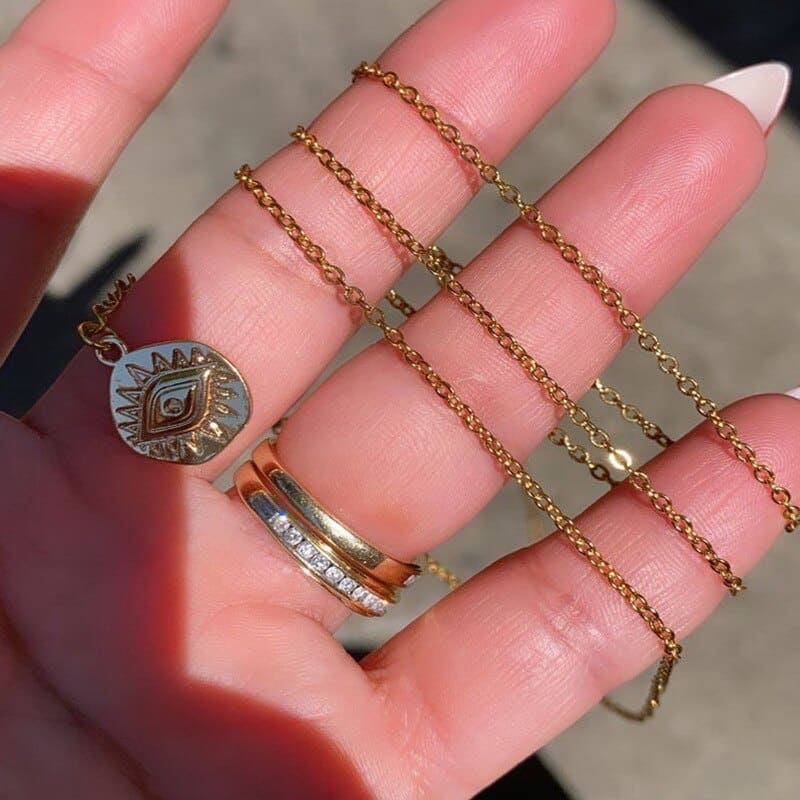 Chaine de taille dorée avec oeil