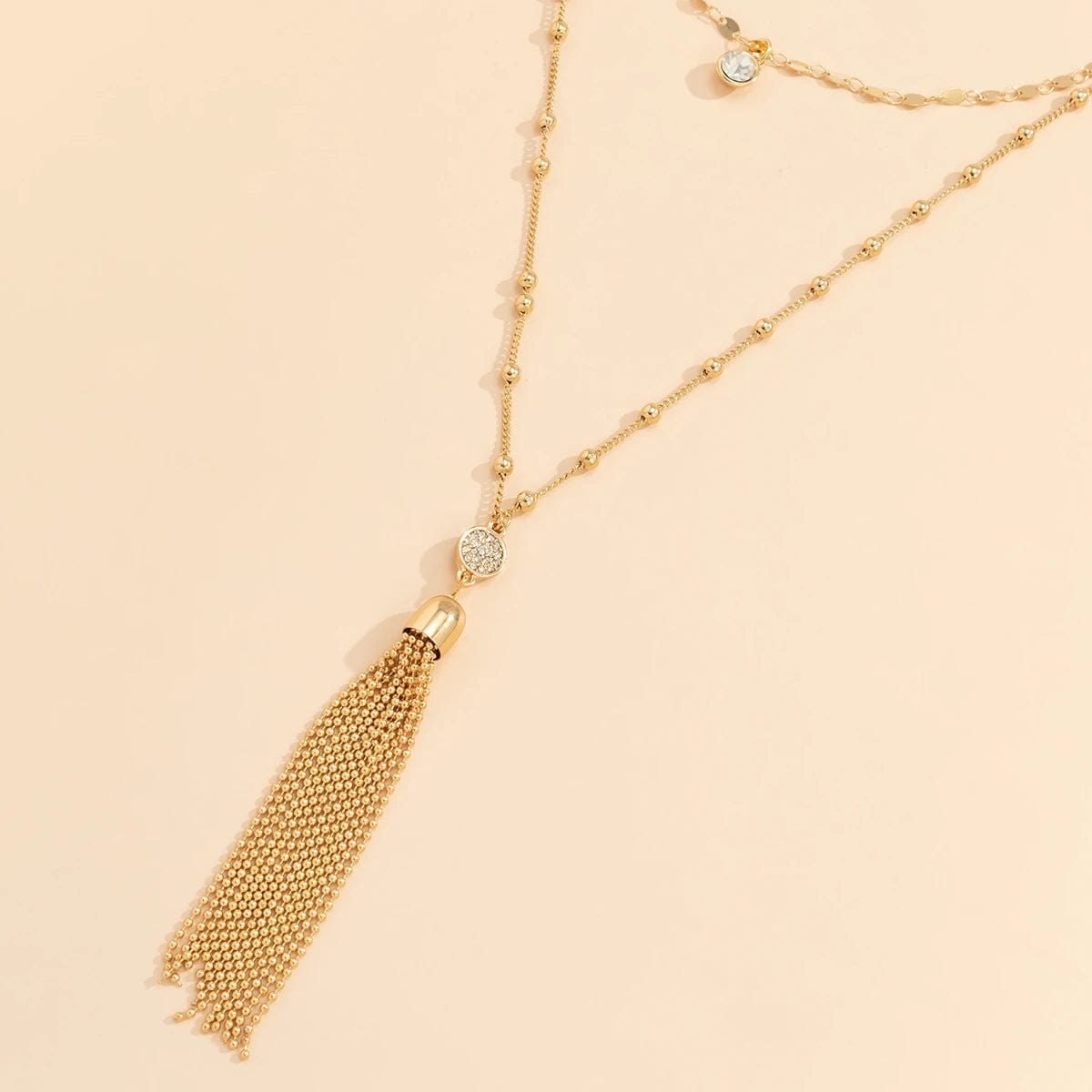 Collier de seins doré